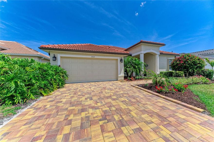 Meticulously updated and maintained with true PRIDE OF OWNERSHIP, this gorgeous home in the friendly neighborhood HOA community of Bobcat Trail offers a standout opportunity to live in North Port and feel like you “have it all.” The astonishing curb appeal of this home is lush with mature landscaping, and welcoming with newly placed pavers. 

Throughout this 3-bedroom, 2-bathroom home, you will find lofty cathedral ceilings, an open layout, quartz countertops, contemporary cabinetry, custom tile work, and modern lighting fixtures. Recessed built-ins throughout the living areas and primary bedroom beautifully showcase your comforts and collections within a quiet, inviting space. Each bedroom features a true walk-in closet, and the second bathroom includes direct access to the screened pool and spa patio—an enormous convenience for swimmers.

The covered lanai currently serves as a private, year-round outdoor living room. A converging set of zero-post, cornerless sliding glass doors opens completely, blending the interior with the patio and nearly doubling the living and entertaining space. Custom Hunter Douglas light-filtering sliding door shades, along with plantation shutters, add a soft touch to the natural light while providing additional privacy to an already private lot with a serene Greenbelt Preserve backdrop for the screened patio, pool, and spa area.

Bobcat Trail is one of the few communities in North Port with connected natural gas service. The water heater, pool and spa heater, and dryer all operate on natural gas, and the kitchen is also plumbed for a gas range.

Extensive seller-performed updates include:

Tile Roof & Gutters: Replaced (2023)
HVAC System: Replaced (2022)
Pavers Installed to Driveway/Walk-way (2025)
Pool & Spa: Resurfaced; pool cage re-screened (2022)
Whole-House Hurricane Protection: Accordion-style shutters on every window and door, plus three Kevlar electronic hurricane shutters protecting the lanai (2024)