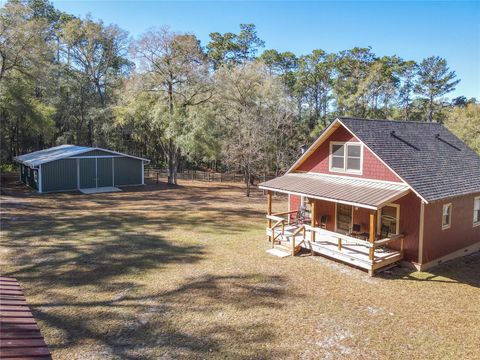 Photo of 19534 Fox Den Lane, Altoona, FL 32702 (MLS # G5109070)