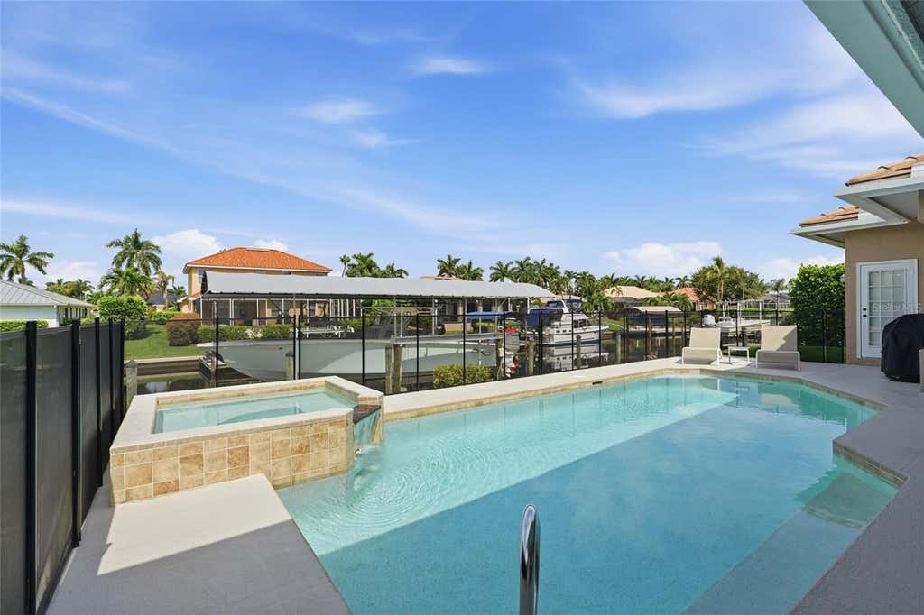 Photo of 5020 SW 8th Place, Cape Coral, FL 33914 (MLS # TB8537852)