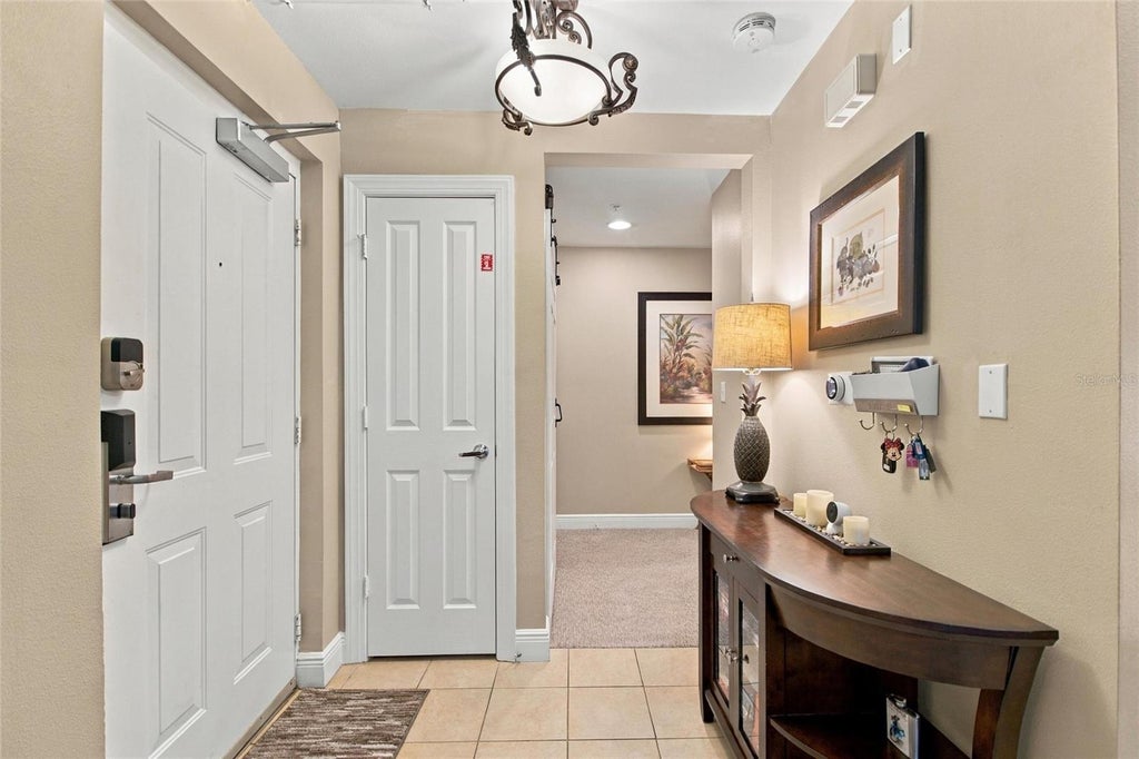 Photo of 7697 Heritage Crossing Way #201, Kissimmee, FL 34747 (MLS # S5159098)