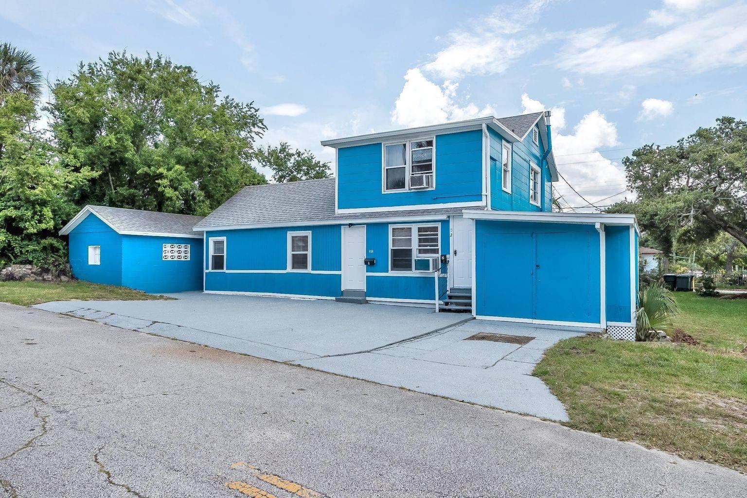 Live in the 3 bedroom unit and rent the other 3 apartments or rent all 4 units. Additional units are: one 1-BR unit upstairs and 2 studio apartments with kitchen. 2 long term tenants. extra income from storage sheds. Well maintained building on huge corner lot. Short walk to the beach and intracoastal. One meter for all 4 units. Community Washer & dryer