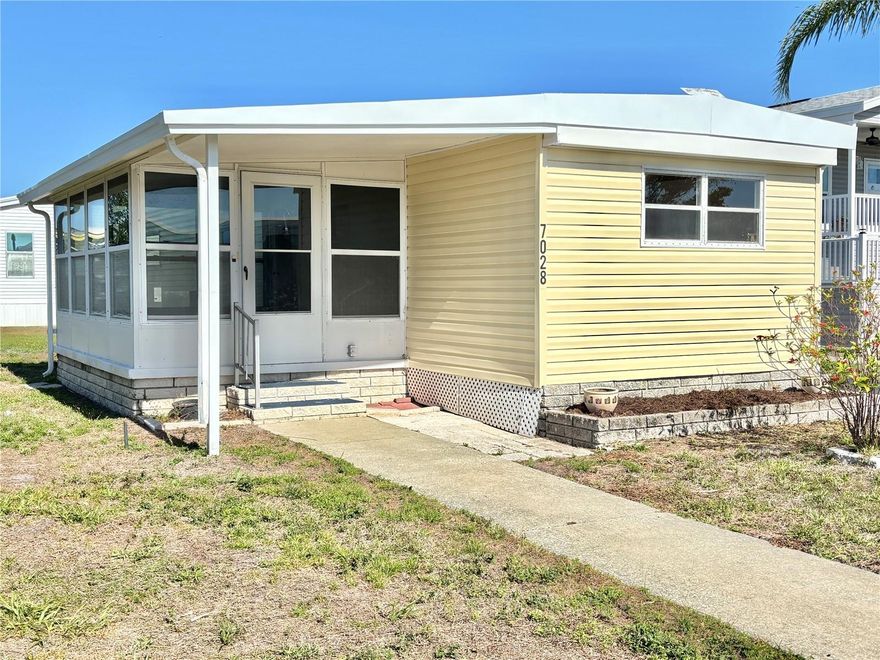 ANNUAL RENTAL in 55+ community! 2026 remodeled 2 bed/2 bath home is located in popular Americana Cove, a 55+ waterfront factory-built housing community only 10 mins from downtown St. Petersburg. This home does not disappoint! With a split bedroom plan for extra privacy, the beautiful remodel includes wide-plank waterproof luxury vinyl flooring throughout--no carpet, new kitchen with stainless appliances, new cabinets and granite countertops, luxury baths with walk in showers for ease of use, a 160 sq ft Florida room to enjoy the views, inside washer and dryer, 2025 roof, 2023 HVAC system, and 2026 electrical panel. Driveway holds two cars easily plus a one-car carport. Just move in and enjoy! Rental fee is $1,550 per month and includes water, sewer, trash pick up, lawn mowing, 24 hr manned gate, private streets and all amenities including heated pool, fitness, billiards, two community boat ramps and kayak launch, clubhouse and so much more! Other expenses are electric and cable/internet. Deposit with contract is $1,550. Two pets (dogs or cats) up to 35 pounds are welcomed. $250 nonrefundable pet deposit. Management requires background/credit check for all tenants with $100 processing fee. Community location is excellent as its minutes from 4th Street shopping, dining and grocery. I-275 is 10 mins away and two airports are 20 mins away. This is the retirement community you've been waiting for!