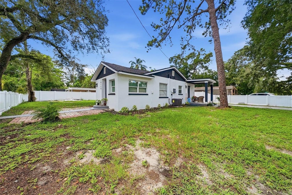 Photo of 10124 N Hyacinth Avenue, Tampa, FL 33612 (MLS # L4964770)