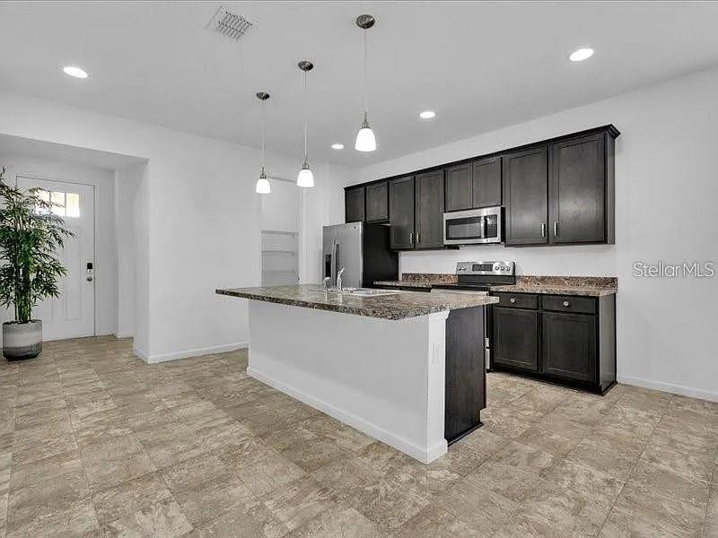 Photo of 380 Lake Smart Circle, Winter Haven, FL 33881 (MLS # G5117422)
