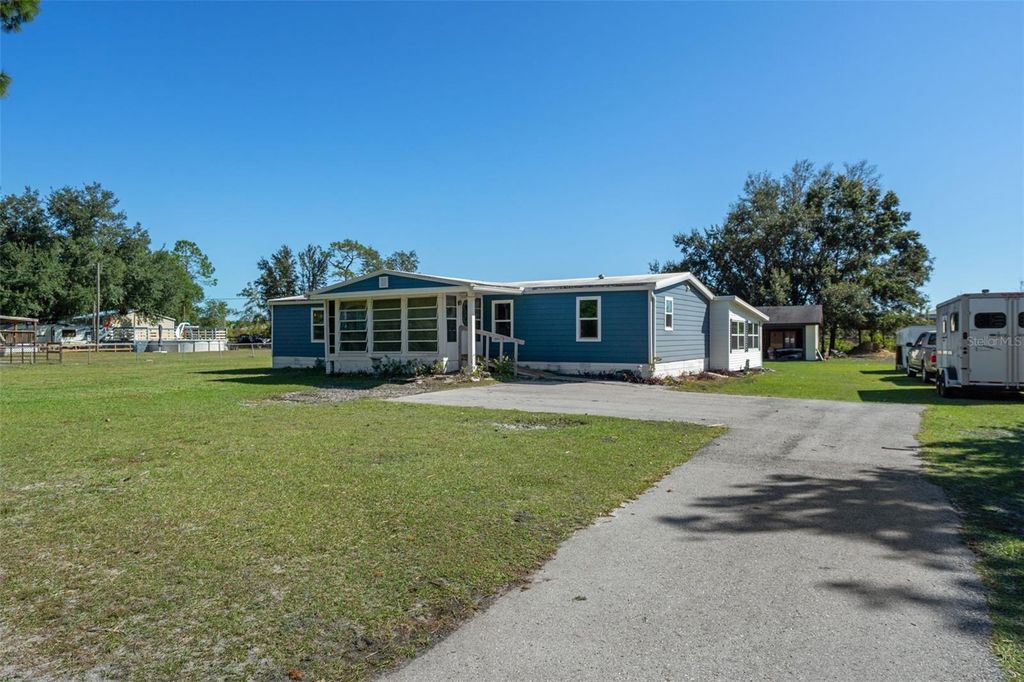 Photo of 3816 Fox Ridge Boulevard, Wesley Chapel, FL 33543 (MLS # W7880072)