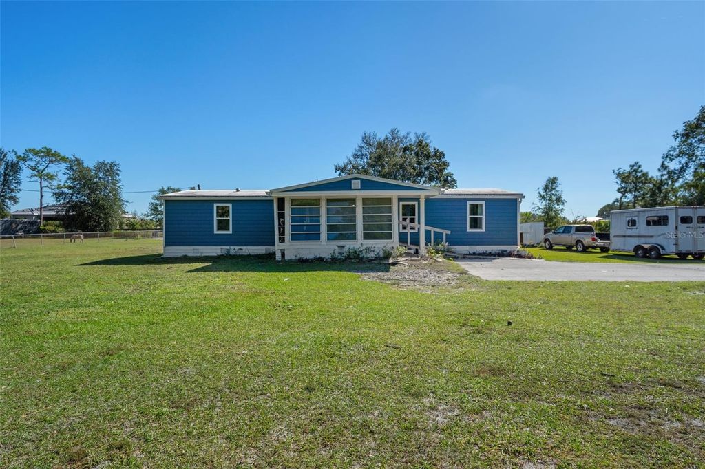Photo of 3816 Fox Ridge Boulevard, Wesley Chapel, FL 33543 (MLS # W7880072)