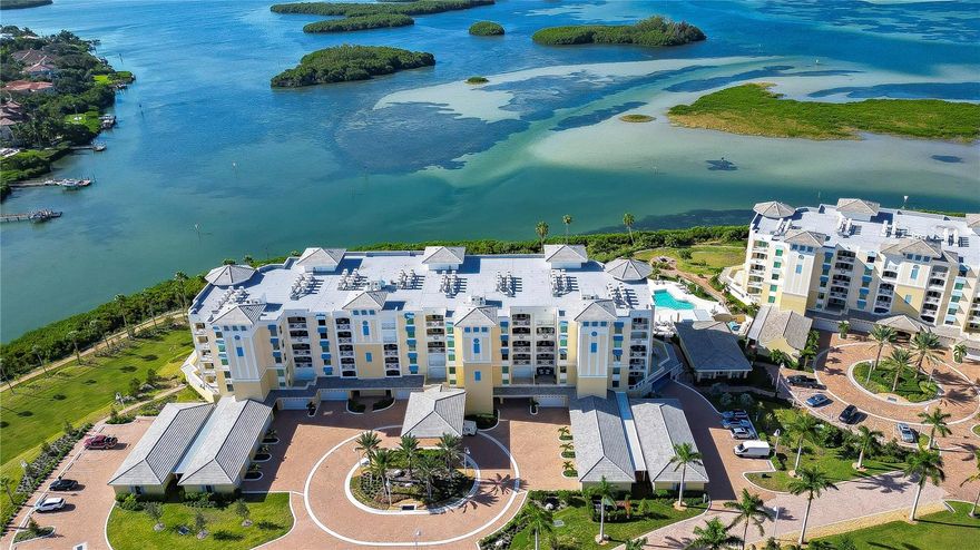 One or more photo(s) has been virtually staged. EVERY DAY FEELS LIKE A VACATION AT YOUR PRIVATE BEACH PARADISE! This property in Sunset Pointe at Collany Key is a dream home come true for those who are looking for a luxurious and private beachfront condo. Located in Tierra Verde, this top-floor corner unit is a 3 bedroom/3.5 bath high-end condo built in 2022 and it offers 2,721 sq ft of open living space with breathtaking views of the GULF OF MEXICO. The private beach is adjacent to the 1800-acre state preserve, a perfect place to take a stroll on the bright-white soft sandy beaches. This highly desirable top-floor corner unit is well-appointed with custom-designer finishes and upgrades. A private foyer, two separate balconies, a semi-private elevator, ensuite bathrooms, luxury stainless steel appliances, large wet bar with ice machine, wine refrigerator with Kohler bar sink and faucet, upgraded Pelican water softener and filtration system, low voltage wiring to all windows and sliding glass doors, leak defense system, remote control hurricane shutters, spacious laundry room including Whirlpool washer and dryer with a large laundry sink, private 2-car garage next to your own private spacious air-conditioned storage unit. With over $116,000 in additional upgrades imagine waking up and sitting on your expansive front balcony sipping your morning coffee and enjoying the view and possibly seeing a dolphin playing in the waters of the Gulf. Incredible amenities include a GeoThermal pool and spa, bocce ball courts, putting and chipping green, gas firepits, a covered outdoor kitchen, bar, and barbecue facilities, a waterfront boardwalk, vehicle charging stations, kayak launch, fitness room, fishing dock, dog park, and PRIVATE BEACH access. You are surrounded by some of the most beautiful waters and beaches on the Gulf Coast. For those of you who like to play tennis or golf, the Isla Del Sol Yacht and Country Club is 5 minutes to the north. Watch in person your favorite MLB, NHL, and NFL team play within 15 to 40 minutes of drive time depending on the sport of your preference. This property is perfect for those who want to be close to the action of downtown St. Petersburg with its fine dining, entertainment, shopping, arts, and pristine beaches, and is just 15 minutes away. For the jet setter, St. Pete/Clearwater International Airport is just 25 minutes away and Tampa International Airport is 40 minutes away. This is truly a luxurious and upscale beach paradise with stunning sunsets and the perfect place for private high-end resort living. Call for your exclusive showing of this stunning luxury residence. This is a recently completely property that has never been lived in, so some of these images are virtually staged. Room Feature: Linen Closet In Bath (Primary Bedroom).