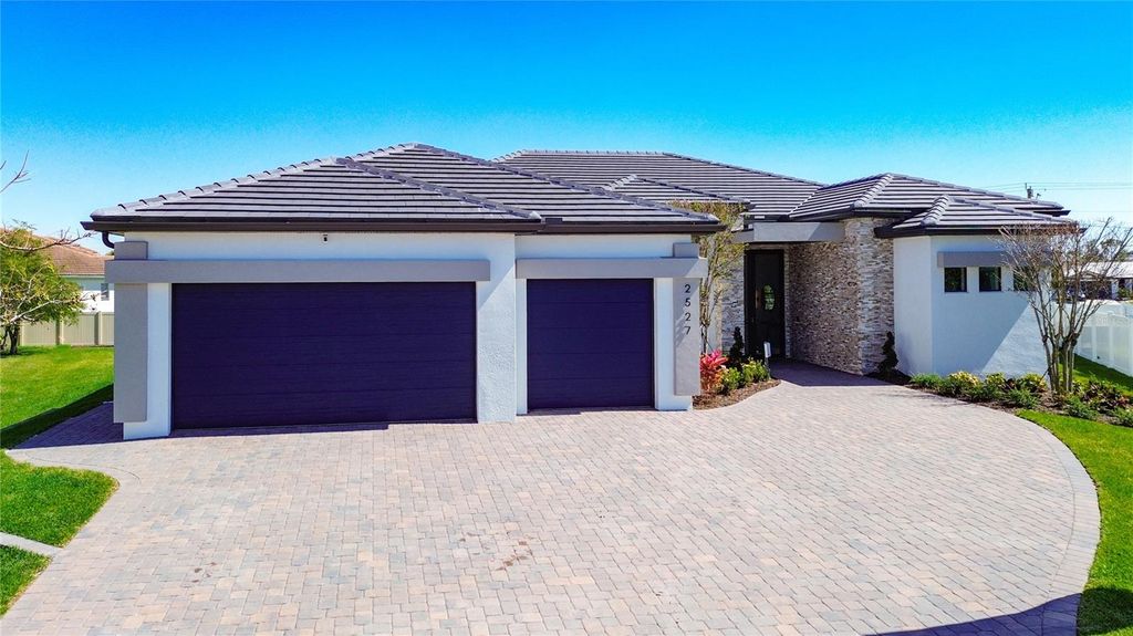 Photo of 2527 Gleason Parkway, Cape Coral, FL 33914 (MLS # C7525521)
