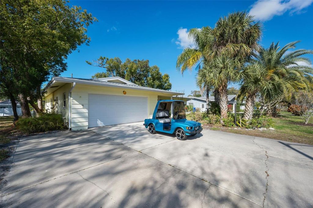 Photo of 2310 Sarazen Dr, Dunedin, FL 34698 (MLS # TB8468877)