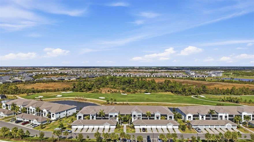 Welcome to your new slice of paradise in the highly sought-after Wellen Park Golf & Country Club! This immaculate 2-bedroom plus den, 2-bathroom, end unit veranda condo, with golf membership included, offers a perfect blend of comfort, style, and easy-living - ideal for full-time residents or seasonal snowbirds. Step inside to discover a light-filled, open floor plan designed for modern living. The spacious living area with vaulted ceilings flows seamlessly into the dining space and kitchen, creating an inviting atmosphere for everyday living and entertaining. Neutral finishes and abundant natural light enhance the relaxed, coastal vibe. The well-appointed kitchen features ample cabinetry and breakfast bar seating -  everything you need for preparing meals at home or hosting guests. Enjoy views of the golf course from the primary bedroom featuring a spacious en suite and two walk-in closets. The guest bedroom offers generous closet space and easy access to the full bathroom. The welcoming den is the perfect area to set up your home office or create an extra space for guests. Slide open the doors to your private veranda overlooking a beautiful pond and the 11th fairway of the pristine golf course — a serene outdoor retreat where you can enjoy your morning coffee or just the gentle Florida breeze. It’s the perfect spot to relax and unwind! The private 1-car garage adds convenience and extra storage, and the second-floor location means no neighbors above—just quiet, elevated living. Residents of Wellen Park Golf & Country Club enjoy resort-style amenities including a championship-level golf course, a Tikki Bar, resort-style pool and spa, fitness center, tennis and pickleball courts, bocce ball courts, a dog park, and a social calendar with clubs, events, and activities for all to enjoy. Ideally located near downtown Wellen Park, shopping, dining, and beautiful Gulf beaches, this condo is perfect as a full-time residence, seasonal retreat, or investment opportunity. Don’t miss your chance to own in one of Wellen Park’s premier golf and lifestyle communities. Schedule your private showing today!