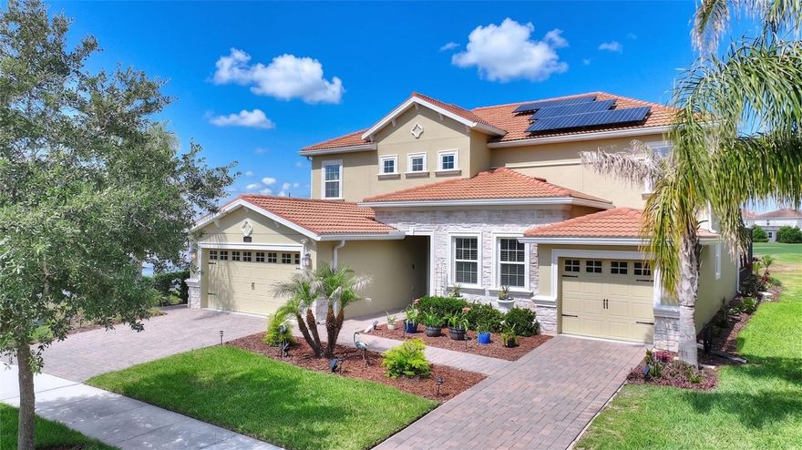 Absolutely flawless! Stunning Next-Gen Liberation Model with private In-Law Suite located on one of the most spectacular lots inside the exclusive gated community of ChampionsGate Country Club! ***GOLF COURSE FRONTAGE | PREMIUM LOT | SALTWATER POOL | PAID-OFF SOLAR !*** Opportunities like this rarely come available. Perfectly positioned on the 8th hole, this beautifully upgraded 6-bedroom, 4.5-bath home offers breathtaking panoramic views of the golf course, pond, fountains, and putting green right from your oversized screened lanai. Enjoy fireworks, hot air balloons, and one of the most impressive backdrops in the community. The exterior of the home has recently been painted, giving the property incredible curb appeal. The paid-off solar system is a massive bonus, with the current owners averaging approximately just $33 per month in electric bills — even while heating the saltwater pool. Inside, the home shows like new and features an open-concept floorplan ideal for entertaining, complete with upgraded 42” cabinetry, crown molding, quartz countertops, and solid-surface flooring throughout. The owners also invested approximately $7,000 in additional recessed can lighting throughout the home, creating a bright, modern luxury feel in every room. The private attached Next-Gen suite is perfect for multigenerational living and includes its own separate entrance, living room, kitchenette, bedroom, full bath, laundry area, and private one-car garage. ChampionsGate Country Club offers one of the most complete lifestyle packages in Central Florida. HOA includes full golf and tennis membership for the family, access to The Oasis Club, The Plaza, and the Retreat Club water park, gated entries with 24-hour manned security, complete lawn care, trash service, security monitoring, cable, phone, and internet. CDD is included in the taxes. The Oasis Club is a 14,000+ sq ft resort-style clubhouse featuring a restaurant, movie theater, fitness center, game room, tiki bar, lazy river, waterslides, cabanas, and more. Residents also enjoy access to The Plaza, the residents-only clubhouse featuring another restaurant, bar, fitness center, game room, pool, and a $75/month food and beverage credit. In addition, owners have access to the Retreat Club water park, creating one of the most impressive amenity packages anywhere in Central Florida. This is luxury Florida resort living at its finest — an elite home, on an elite lot, with one of the strongest lifestyle and amenity packages in ChampionsGate.