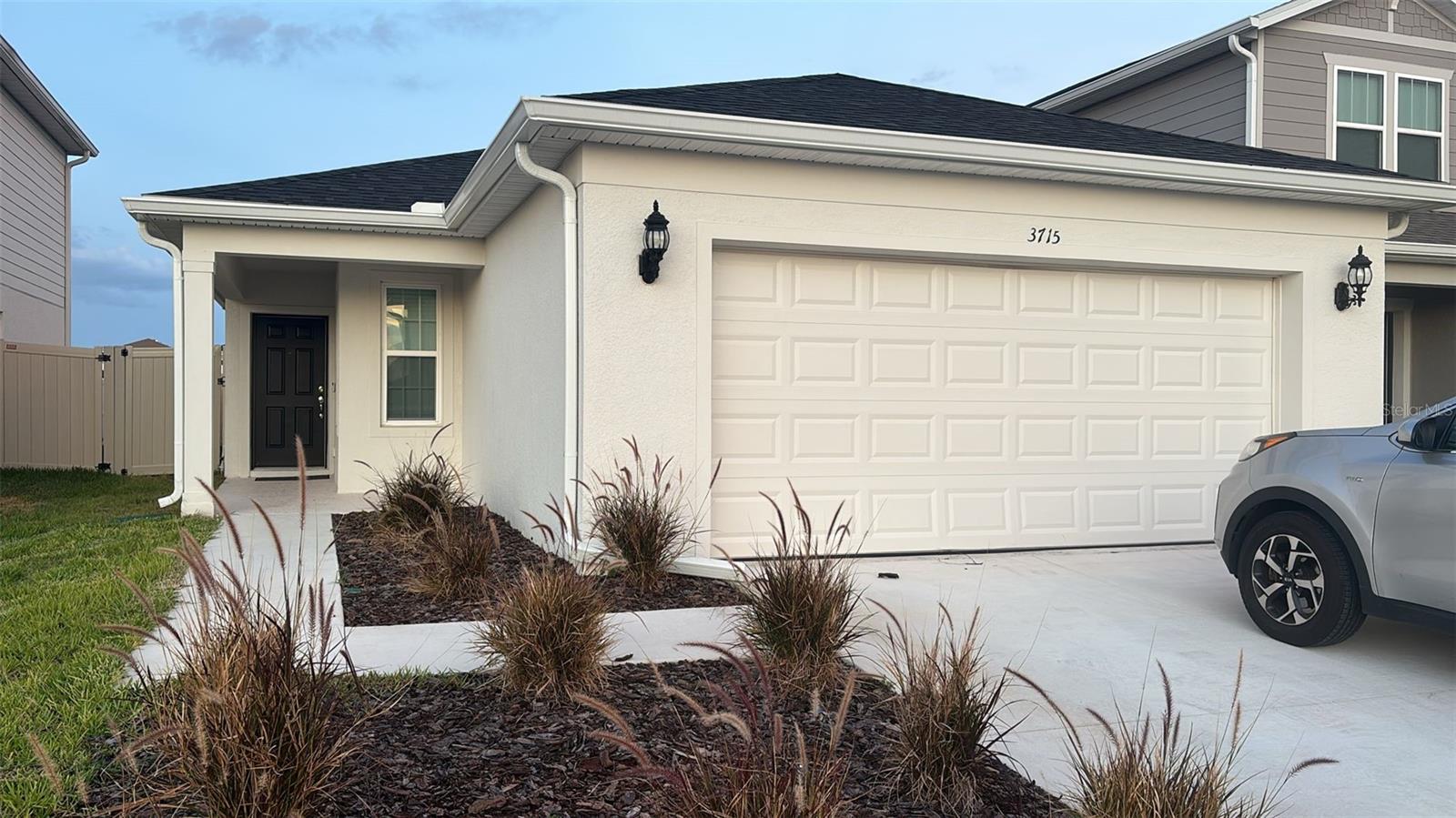 Make this beautiful house your next home! This elegant 4-bedroom residence offers comfortable, modern living with high-quality finishes, including quartz countertops, stainless steel appliances, window blinds installed throughout, a fenced yard, and a covered lanai perfect for outdoor enjoyment. Located in a developing community that will feature a pool, playground, and pet area, and just minutes from I-4, Posner Park, shopping, and restaurants. Cable and internet service are included. Available immediately!