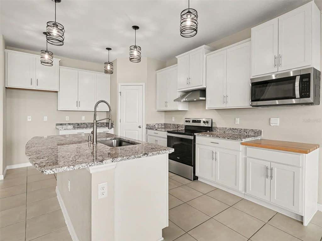 Photo of 1167 Ocean Spray Drive, Ruskin, FL 33570 (MLS # A4701610)