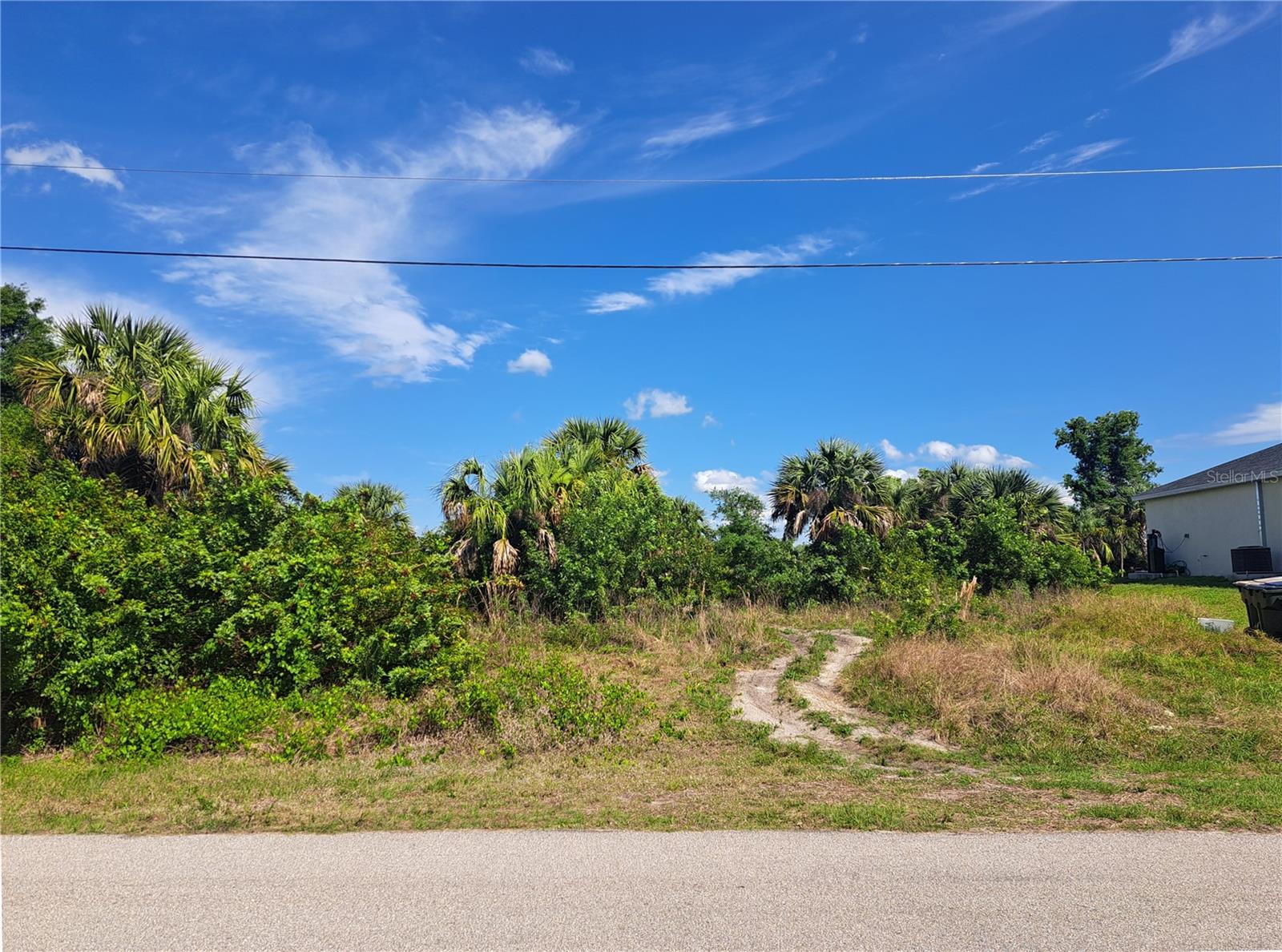 Approximately 80 ft. of canal frontage on the New London Waterway which flows directly into the Cocoplum Waterway, the largest waterway in North Port. No flood insurance required (Zone X according to Sarasota County records) and newer homes are being built nearby. North Port is a growing community offering restaurants, churches, schools, shopping, parks, accessible golf courses, and is the home of the Atlanta Braves training. This property is located close to amenities with quick access to both US 41 and I-75, multiple golf courses in the area and a short drive to world class beaches, boating and fishing. Don’t miss a great opportunity to own a slice of the Florida lifestyle!