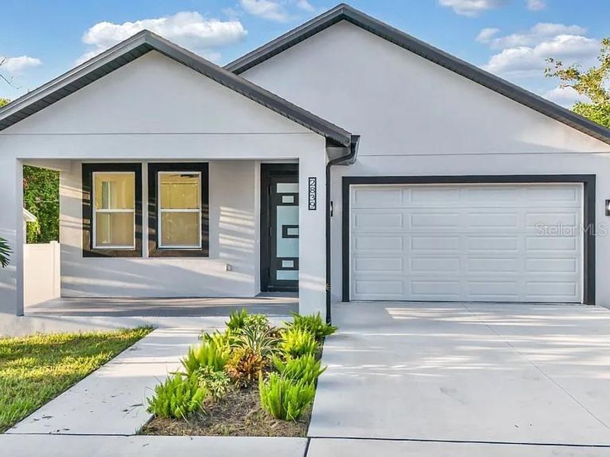 This home was completed in 2024 with all the bells and whistles!!! Welcome to this stunning, 4-bedroom, 3 full bathroom home in the heart of North St. Pete. All stainless-steel kitchen appliances are included!!! This spacious and contemporary family home offers just under 2,700 total square feet and 2104sf of living space and is perfect for those seeking modern amenities, comfort, and style. The open floor plan provides a seamless flow between the living room, dining area, and kitchen, creating a spacious and inviting atmosphere. The gourmet kitchen is equipped with quartz countertops, and island with seating for four, making it a hub for family gatherings and entertaining. Two primary bedrooms features an ensuite bathroom with double sinks, glass shower, and a walk-in closet for added convenience. The second primary has a single vanity, quartz countertops, and glass shower. This home offers three additional bedrooms, perfect for a growing family or for accommodating guests. Huge 8ft exterior and interior doors are located throughout with rear French glass doors, aluminum painted frame impact glass windows, porcelain tile throughout, and over 9ft ceilings with a vaulted ceiling in the great room. This home is ideally located in a friendly community with easy access to schools, parks, shopping, and dining. Just minutes away from the Peer, downtown St. Pete, Clearwater and other beautiful beaches and recreational activities are also within a short drive. Don't miss this opportunity to own a brand-new home in a thriving Florida community. Seller may be willing to help with buyer's closing costs!!!