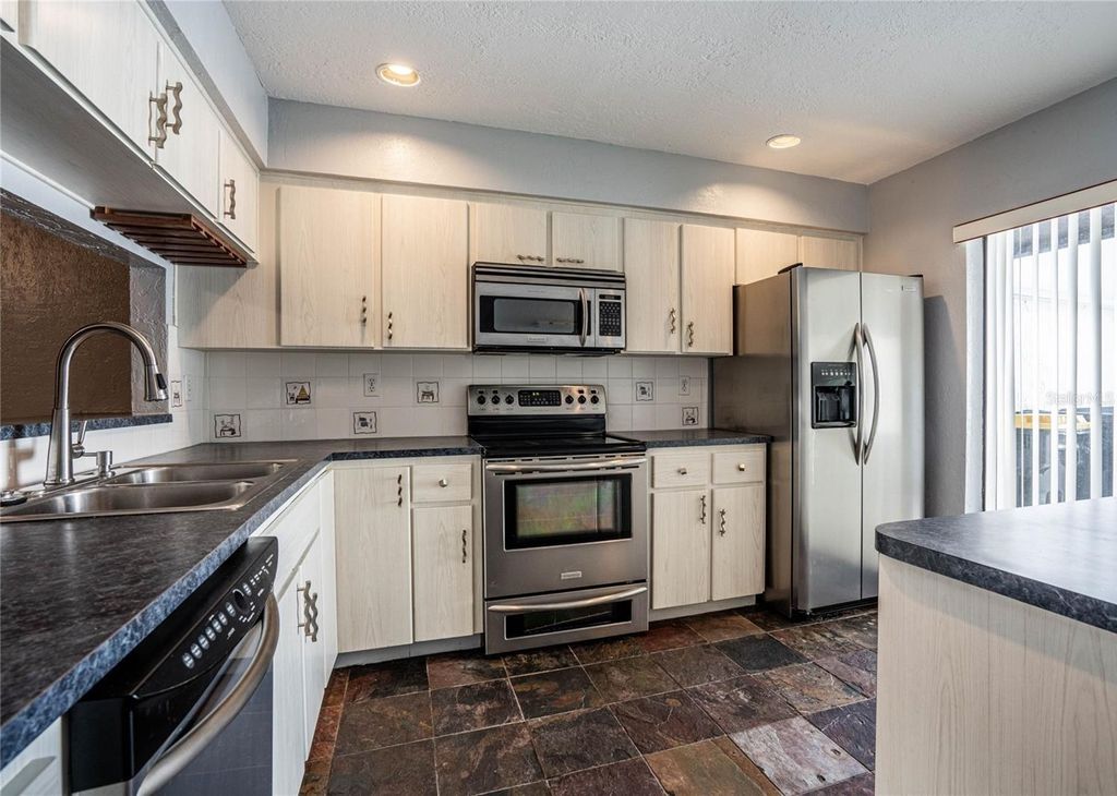 Photo of 8 Huntley Court #8, Haines City, FL 33844 (MLS # L4960529)