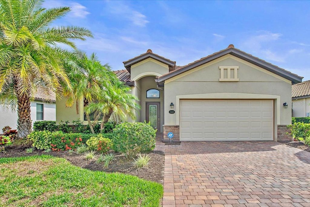 Photo of 148 Wandering Wetlands Cir, Bradenton, FL 34212 (MLS # A4652380)