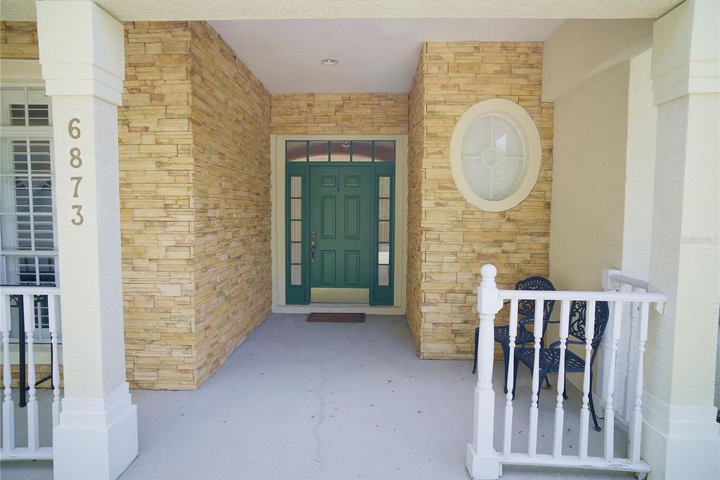Photo of 6873 Scythe Avenue, Orlando, FL 32812 (MLS # O6404838)