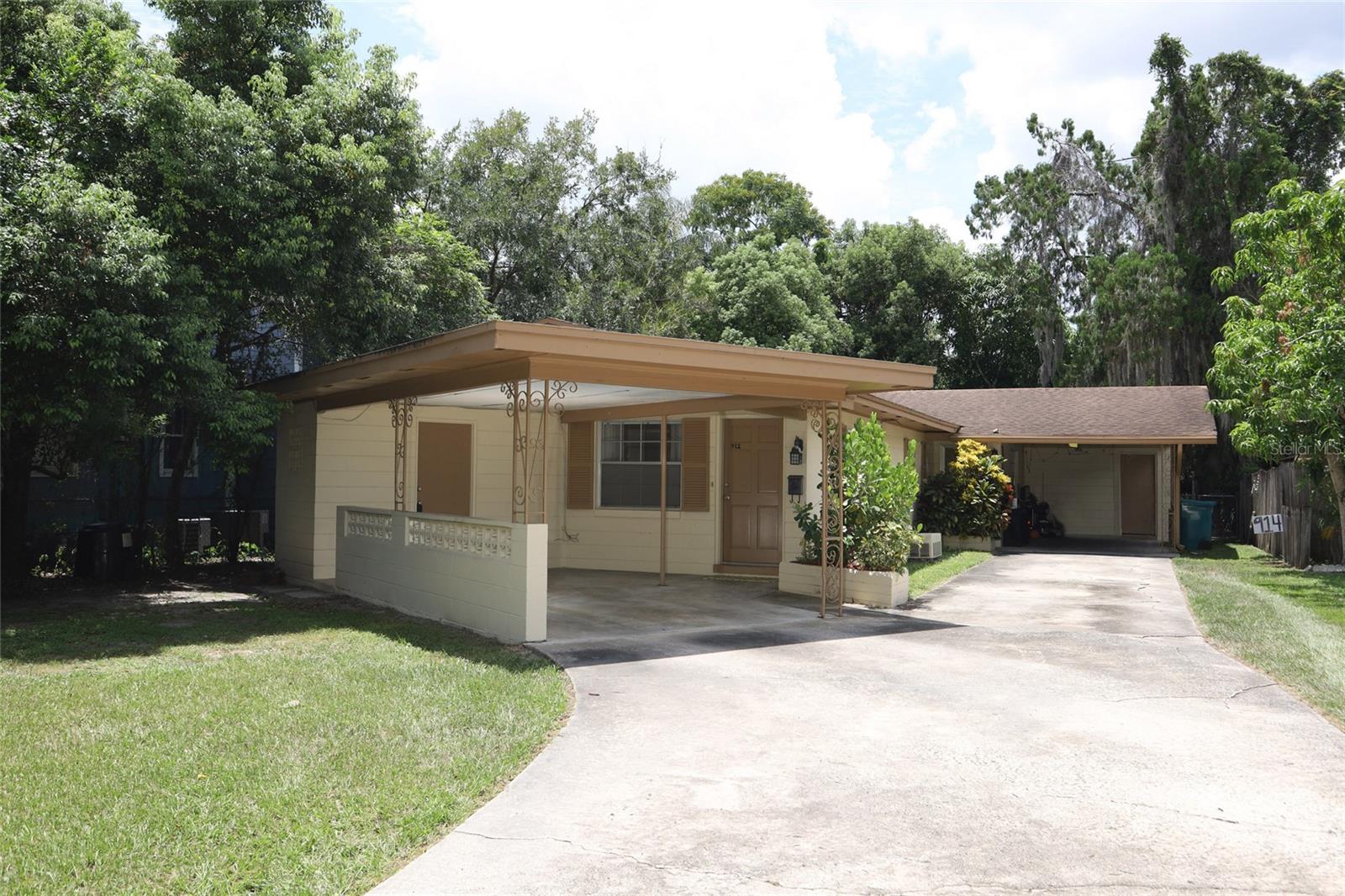 Great opportunity to own this “Murphy” style duplex in the heart of the popular Mills/50 District, nestled between downtown Orlando and Winter Park. Both units are 2 bedrooms, 1 bath, each with carport and large storage/laundry room accessible from the carport and the kitchen. The front unit is freshly painted and ready for a new tenant. The tub surround has all new white tile. The rear unit has sliding glass doors that lead to a fenced in yard. Both units feature tile floors throughout. Current long-time tenant occupies the rear unit, on a month-to-month basis. Great location!! Just minutes to shopping, restaurants, Leu Gardens, Museums, Lake Highland Prep, and Advent Health. John Long community pool & playground are also close by.