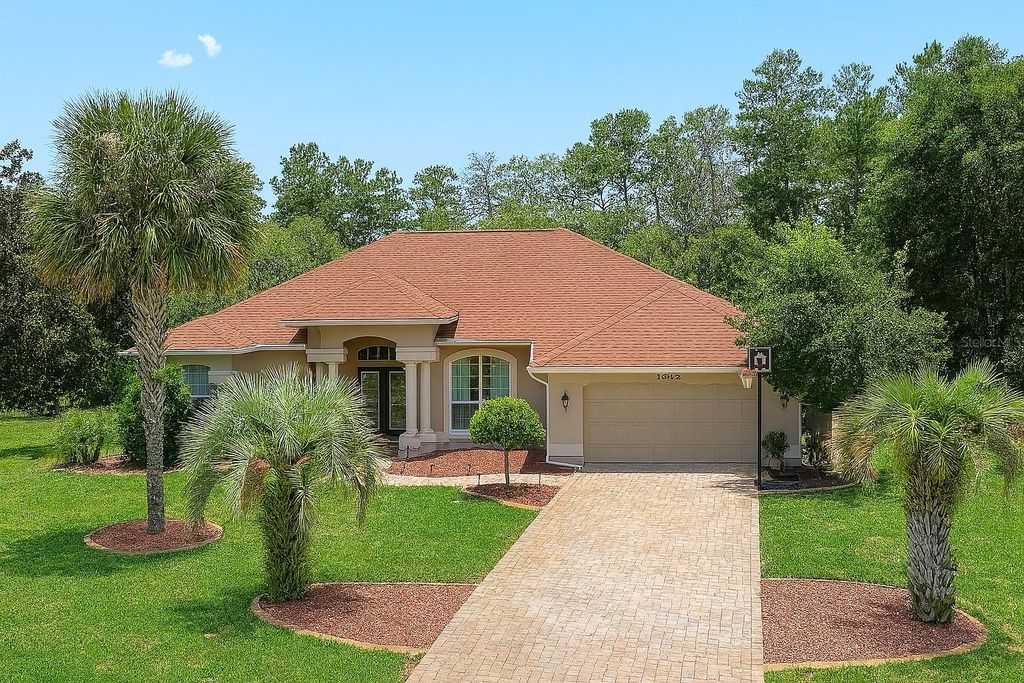 Photo of 10039 Hernando Ridge Rd, Weeki Wachee, FL 34613 (MLS # O6334393)