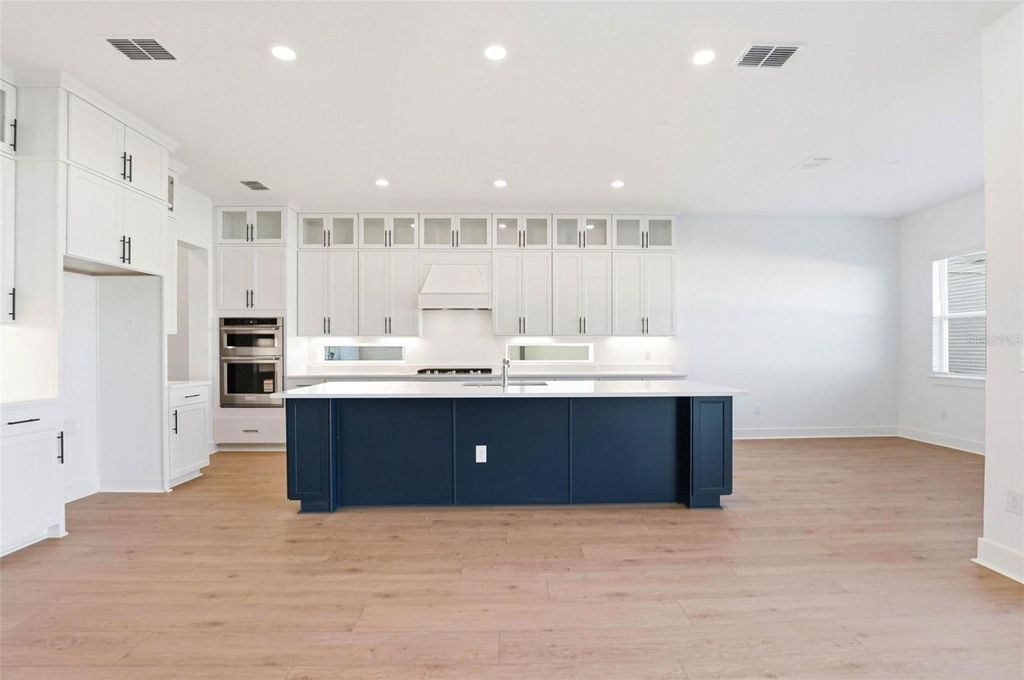 Photo of 6962 Jared Oaks Drive, Wesley Chapel, FL 33545 (MLS # TB8478048)