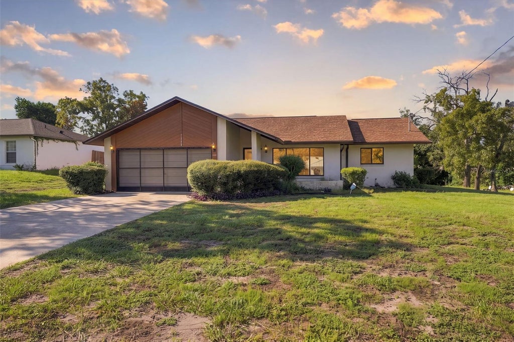 Photo of 11460 Riddle Drive, Spring Hill, FL 34609 (MLS # W7890285)