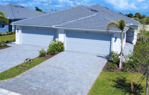 Photo of 8225 Shore Lake Drive, Englewood, FL 34224 (MLS # N6144100)