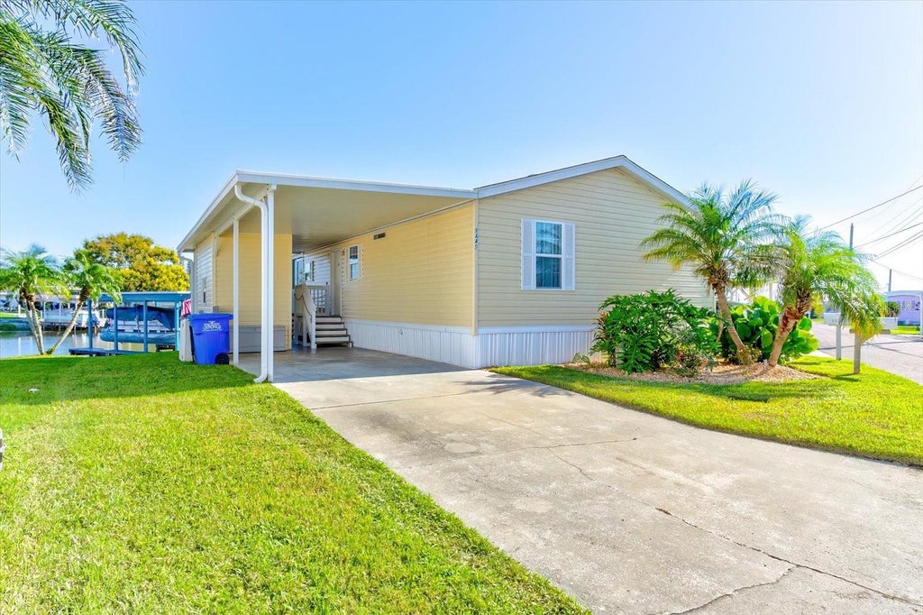 Photo of 1440 S Shore Drive, Tavares, FL 32778 (MLS # G5119270)