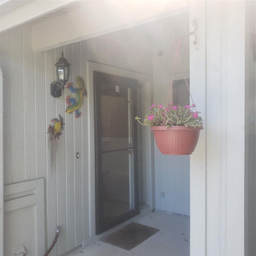 Lovely renovated 2/2 villa in Sea Woods with Ocean access. This villa is at the end of a cul de sac surrounded by rich lavish natural landscaping -front and back. The large  private back patio has a retaining wall, prefect for entertaining and sunning. The property has lots of light. A small enclosed patio was turned into a coffee bar and kitchen storage with a skylight. There are three pools (one heated), 2 tennis courts, handball court, pickleball court, a gym, a sauna, and walking trails. The rich natural foliage makes you feel you are living in paradise. New roof in2021, new AC in 2017, new paver patio with privacy fence. There is a beach access within walking distance just across the street from the complex ;Water: City