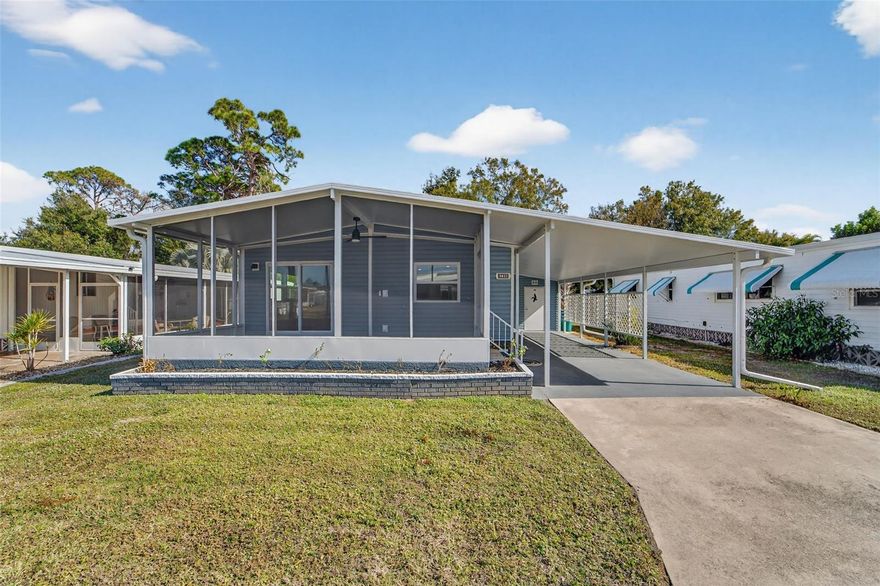 FULLY REMODELED, TURNKEY FURNISHED, PRIME LOCATION. Welcome to this beautifully updated, move-in-ready home located in the sought-after Polynesian Village, a resident-owned 55+ community just 1.3 miles from Manasota Key Beach. Whether you prefer a short drive, bike ride, or leisurely walk, the beach is within easy reach. This home has been completely remodeled from top to bottom, showcasing high-quality finishes throughout. The stunning kitchen features quartz countertops, brand-new appliances, and an open-concept layout that flows seamlessly into the living area. A large center island with room for bar stools makes it perfect for entertaining, while floor-to-ceiling cabinetry on both sides of the refrigerator provides exceptional storage. Enjoy luxury vinyl flooring throughout, along with a screened-in lanai with ceramic tile, adding comfortable extra living space. Major upgrades include a new roof, carport, subfloor, exterior skirting, and vinyl siding (2025), There are new impact windows, new interior doors, and two new sliding glass doors. The A/C was replaced in 2024, offering peace of mind for years to come. The storage shed in the carport has a washer and dryer and a workspace. There is an outdoor shower and pavers in the private backyard with a view of trees. This friendly park has a screened in community pool that is heated year-round, shuffleboard and a clubhouse with many social activities. There is a storage lot with spaces available starting at $130/month. This location is close to numerous stores, restaurants, and golf courses for your convenience. There are multiple beaches nearby in Englewood, Venice and Boca Grande. Call for a showing today to view this beautifully updated home so that you can start enjoying the Florida Lifestyle.