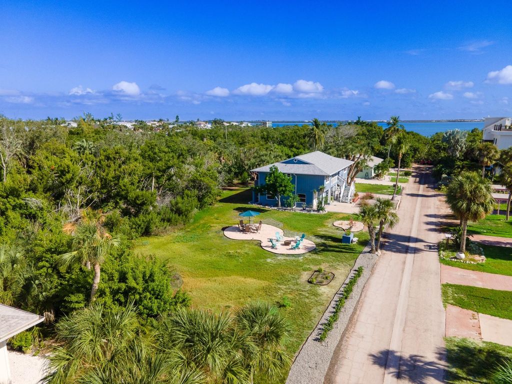 Photo of 681 Gulf Bay Road, Longboat Key, FL 34228 (MLS # A4683898)