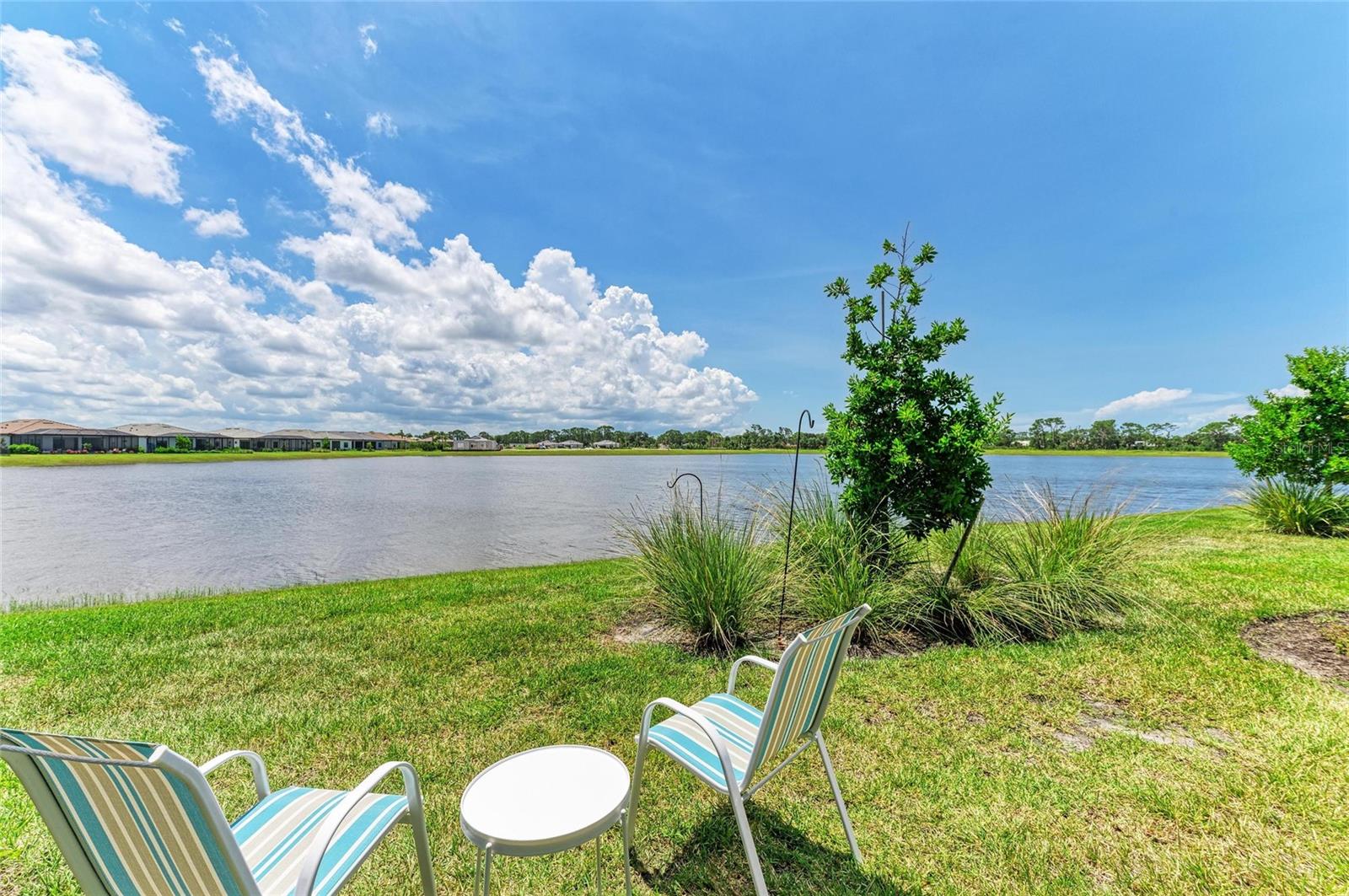 Presenting an extraordinary 2BR plus Den, lakefront villa in the prestigious Talon Preserve on Palmer Ranch - Âthe premier choice for anyone seeking luxury and value in one exceptional package. This nearly new home features a sought after southen exposure that enhances its beauty. Step inside and be captivated by the bright, inviting spaces filled with natural light shining through the PGT Windguard hurricane windows and doors. The expansive kitchen showcases elegant 42-inch upper white cabinets and stunning quartz countertops, complete with a chic backsplash. The open layout seamlessly links the dining and living areas, making it the perfect environment for entertaining or daily family life. The generously sized bedrooms ensure comfort, while the separate den offers an ideal spot for work or relaxation. Retreat to the primary suite, your personal oasis at the back of the home, complete with breathtaking views of the serene lake. The en-suite bath features a sleek walk-in shower, dual sinks for ultimate convenience, and a spacious walk-in closet to accommodate all your storage needs. Picture yourself enjoying peaceful evenings on the expansive lanai, soaking in the tranquil lake views. Talon Preserve is a vibrant resort-style community that elevates your lifestyle to new heights. The amenities center includes an open-air restaurant, an impressive clubhouse with a full-sized gym, full service bar, ballroom, and a heated pool and spa designed for relaxation and leisure. With eight pickleball courts, two tennis courts, and bocce ball courts this community offers an abundance of options for recreation and enjoyment. Residents also benefit from direct gated access to the Legacy Trail, perfect for biking, walking, and running. Situated just 10 minutes from the stunning Suncoast beaches and close to gourmet dining, boutique shops, and the historic downtowns of Venice and Sarasota, Talon Preserve's location is unbeatable. Plus, you are conveniently close to the newly opened Sarasota Memorial Hospital Venice campus. This is your chance to seize an incredible opportunity. Contact us today to arrange your private showing and make this exceptional villa your new home!