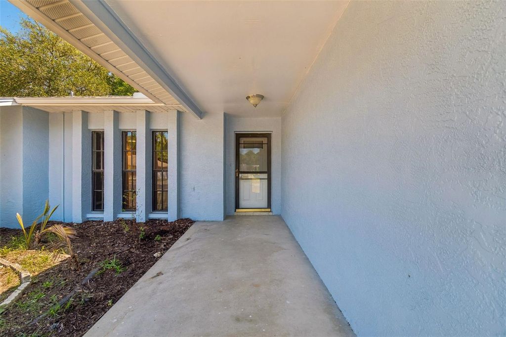 Photo of 8052 Gabriel Drive, Port Richey, FL 34668 (MLS # TB8496974)