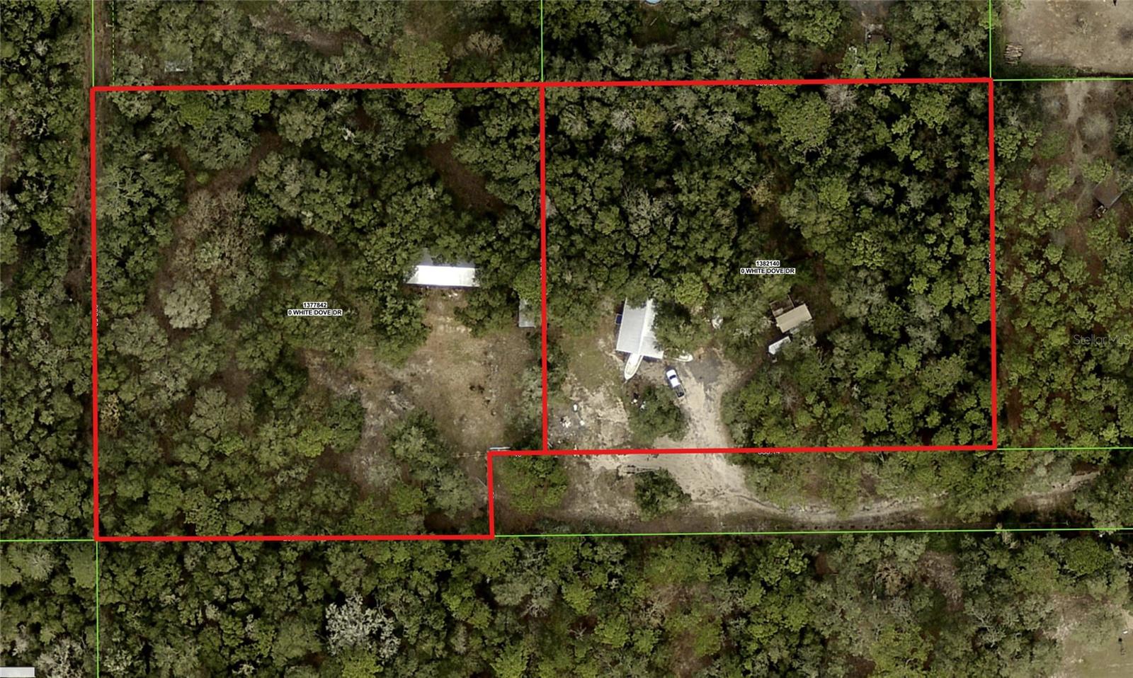 BIG PRICE IMPROVEMENT! Two agricultural parcels totaling 4.6 acres. Both parcels are high/dry (X flood zone) and buildable. Well, septic and electric available. Impact fees paid on one parcel. Property is gated and fully fenced, ready for you to bring your animals. Barn, work shop, "improved' shed, large pavilion, livestock corral and multiple smaller sheds on property. Great location for your new home build or a weekend getaway. Property is been sold as a whole or you can purchase the back 2.5 acre parcel separately. Schedule a private showing today.