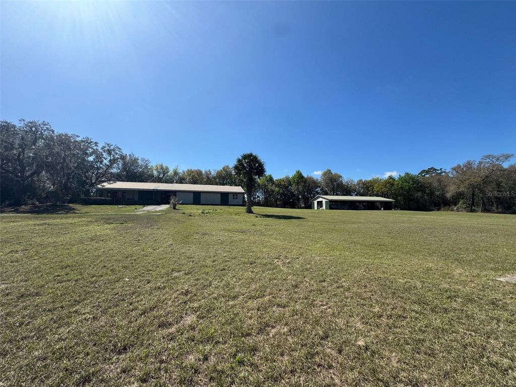 Photo of 1065 S Massachusetts Avenue, Deland, FL 32724 (MLS # V4947779)