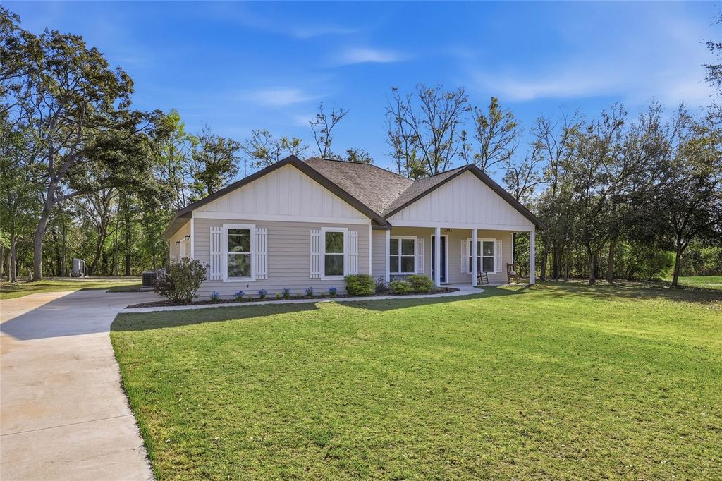 Photo of 8920 NE 8th Place, High Springs, FL 32643 (MLS # GC538451)