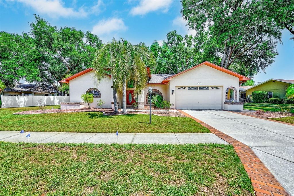 Photo of 9757 Hermosillo Drive, New Port Richey, FL 34655 (MLS # TB8504639)