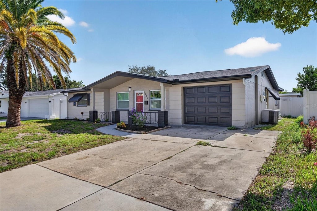 Photo of 1440 Normandy Boulevard, Holiday, FL 34691 (MLS # TB8538590)