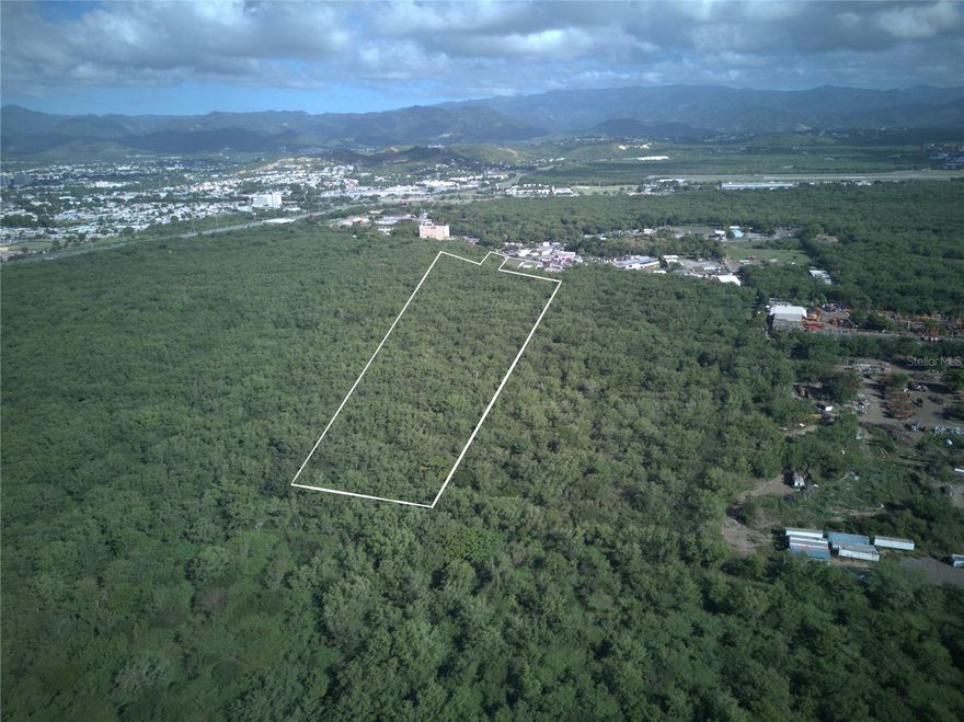 Located in Ponce, Sector Vallas Torres, this expansive industrial development site comprises approximately 25 cuerdas of contiguous land, presenting one of the largest industrial parcels available in the southern region of Puerto Rico. With extensive frontage along Camino Vallas Torres, the property offers a rare blank canvas suitable for a master planned industrial park, corporate headquarters, or large scale logistics operation. Zoned DI-1 (Light Industrial), the site is ideal for high capacity warehouses, distribution centers, and light manufacturing uses. Its irregular configuration allows for multiple access points, providing flexibility for heavy vehicle circulation and efficient distribution flow. Utilities are available nearby, and the location serves as a strategic link to southern Puerto Rico’s maritime and air ports, positioning the property as a strong investment opportunity for industrial and logistics driven development. CRIM: $1,588 annually