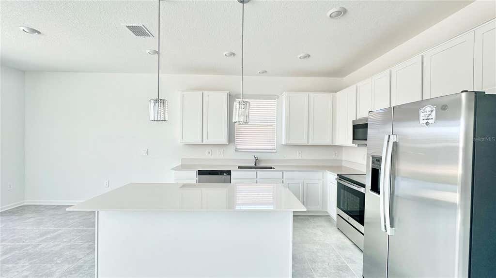 Photo of 683 Daring Drive, Davenport, FL 33837 (MLS # O6418869)