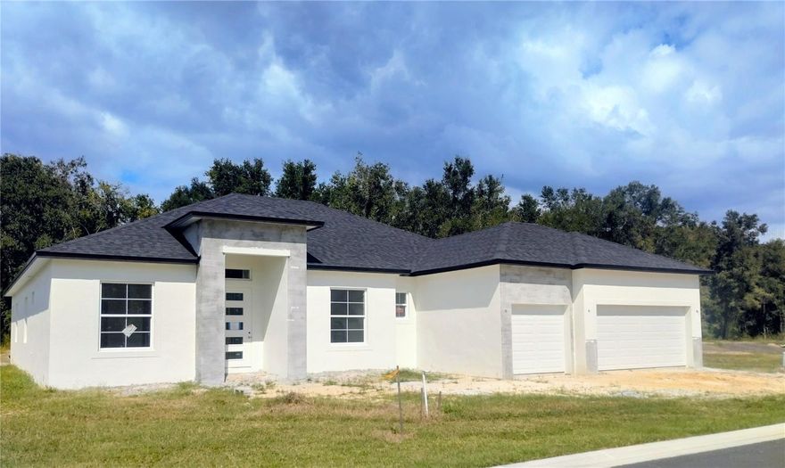 Under Construction. Gorgeous, new pool home in South Lakeland subdivision! Open, spacious split floor plan with 4 bedrooms and 3 full baths!  Stunning beam ceilings in great room & tray in master bedroom. Wood tile floors throughout, except bedrooms! The kitchen features white Shaker-style cabinets, bar area, upgraded appliances, stone counter tops, and lots of counter space. Custom closets included. Beautiful screened pool area with oversized lanai! Top quality home tastefully designed by an interior decorator! Pictures reflect the finished product. Furniture & accessories are not included. Realtor/Owner.
