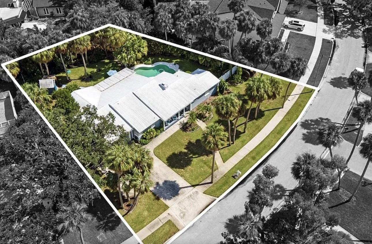 This expansive property offers a rare opportunity in the highly desirable Sunset Park neighborhood. Located on the coveted west side of Westshore Blvd., it enjoys a peaceful setting with a small canal and lush greenery enhancing its privacy. The lot’s serene street contains only ten homes with no through traffic. The lot spans 17,403 sq ft (0.412 acres) with a generous 153-foot frontage, providing ample space for your dream home, a large pool, and even outdoor recreational areas. Alternatively, you could explore the possibility of subdividing the property into two buildable lots. This incredible property is within the top-rated Dale Mabry, Coleman, and Plant School Districts. Located a few blocks from a new neighborhood park opening this spring and minutes to Downtown Tampa, Tampa International Airport, restaurants, and shopping at International
