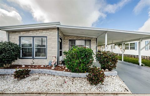 Photo of 719 Sugar Palm Street, Largo, FL 33778 (MLS # TB8368367)