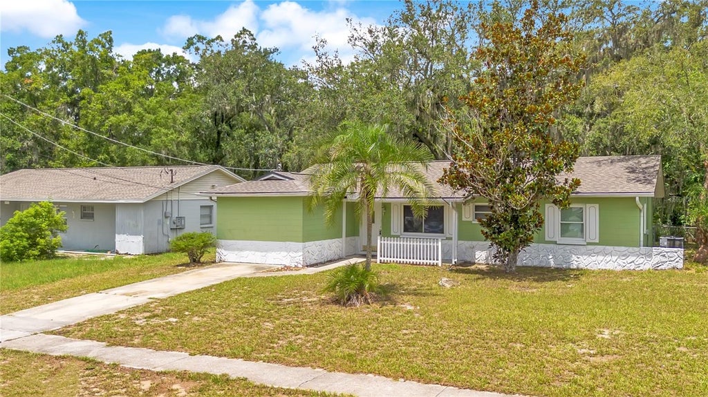 Photo of 8316 Tupelo Dr, Temple Terrace, FL 33637 (MLS # L4963431)