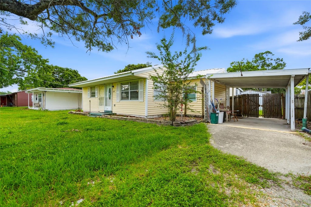 Photo of 128 NW 10th Drive, Mulberry, FL 33860 (MLS # TB8520100)