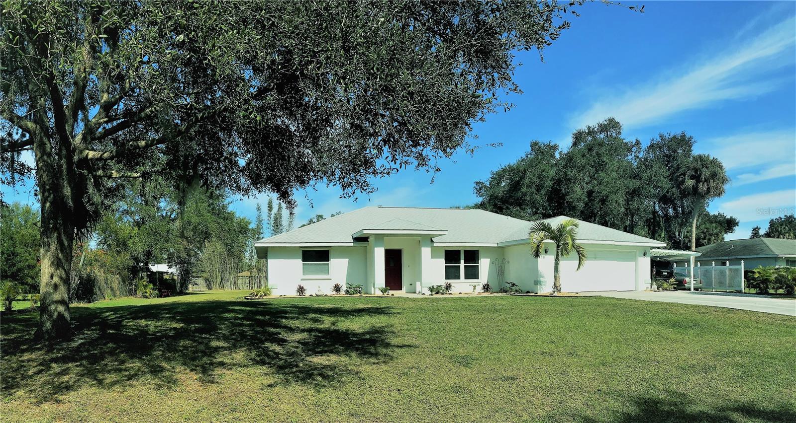 Available for this upcoming winter season!
Where do we start with this one?...From top to bottom and from inside out, it's checklist covers size, location, heated pool, outdoor living space, luxury finishes, 3 bedrooms, 2 baths, 2 car garage, additional covered parking, privacy on a 1/2 acre lot, with boat/rv parking, just to start.
Located on a quiet cul de sac off the beaten path but yet close to Nokomis and surrounding beaches, Historic Downtown Venice Island, Legacy Trail, nature preserves, kayak and boat launches, an abundance of great restaurants and having all the conveniences you could ask for nearby yet still has a feeling of being tucked away in it's own private little world.
The lanai offers 1200 sq ft of outdoor living on top of the approx 2400 sqft inside. The solar heated pool has a waterfall, bench seating with jets and table built in.
A living room area welcomes you with vaulted ceilings and wood tile flooring in as you enter.
Boasting an enormous kitchen with cherry cabinets and pantry areas, black stainless steal appliances, granite counter tops, custom mosaic backsplash, copper sink and high end finishes all flow into the family room and dining room, creating one large open concept space, especially if you open up those double french doors leading out to the pool area.
With the desirable split bedroom floor plan, the large primary suite has double closets, high end carpeting and an attached en suite bath to die for. A travertine custom designed walk-in shower with dual shower heads, built in bench, floating marble vanity with petrified wood sink and waterfall faucet. The 2nd spacious bedroom, hosts a king bed also with double closets and main bath. The 3rd bedroom, just as spacious hosts a full sized bed and work space area.
You'll find plenty of closet space and storage, interior laundry room, oversized 2 car garage and an additional covered pergola carport also.
