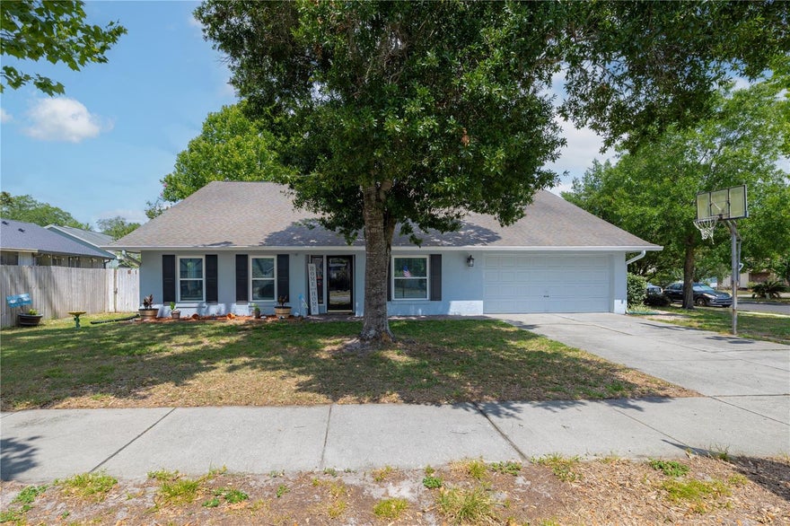 Discover the perfect blend of comfort, style, and location in this beautifully maintained 4-bedroom, 2.5-bath home located in the highly desirable Alafaya Woods community in Oviedo. Perfectly positioned on a spacious corner lot, this property combines functionality, charm, and modern upgrades. From the moment you arrive, you’ll appreciate the pride of ownership and the many valuable improvements throughout the home.

Inside, you’ll find an inviting and versatile layout featuring a formal living room, dining room, and an oversized family room designed for both everyday living and entertaining. The home showcases beautifully remodeled bathrooms, brand-new luxury vinyl flooring throughout the home, and a bright, welcoming atmosphere with plenty of natural light flowing throughout the living spaces.

The kitchen is thoughtfully positioned overlooking the main living areas, creating a seamless connection ideal for gatherings, family time, and entertaining guests. The spacious family room provides endless possibilities for relaxing, hosting celebrations, movie nights, or creating the perfect flex space to fit your lifestyle.

Major improvements provide peace of mind for future homeowners, including a roof replaced in 2016, updated windows installed in 2019, a brand-new A/C system in 2025, and a water heater replaced in 2024. These significant updates make this home move-in ready while adding long-term value and efficiency.

Step outside and enjoy the oversized backyard with ample space to create your ideal outdoor retreat, add a pool, entertain, garden, or simply enjoy Florida living year-round. The corner lot location provides additional privacy, curb appeal, and extra outdoor space rarely found in similar homes.

Location is everything, and this home truly delivers. Conveniently located near top-rated Seminole County schools, shopping, dining, parks, and major highways, residents enjoy quick access to everything Central Florida has available. Just minutes from University of Central Florida, Research Park, Siemens, Lockheed Martin, and major employers, this property is ideal for families, professionals, and investors alike. Enjoy nearby outdoor recreation at Oviedo on the Park, trails, sports complexes, and multiple community parks, while still being within easy reach of Downtown Orlando, Orlando International Airport, and world-famous attractions.

This is an exceptional opportunity to own a beautifully updated home in one of Oviedo’s most established and sought-after communities. Schedule your private showing today and experience everything this incredible property has available.