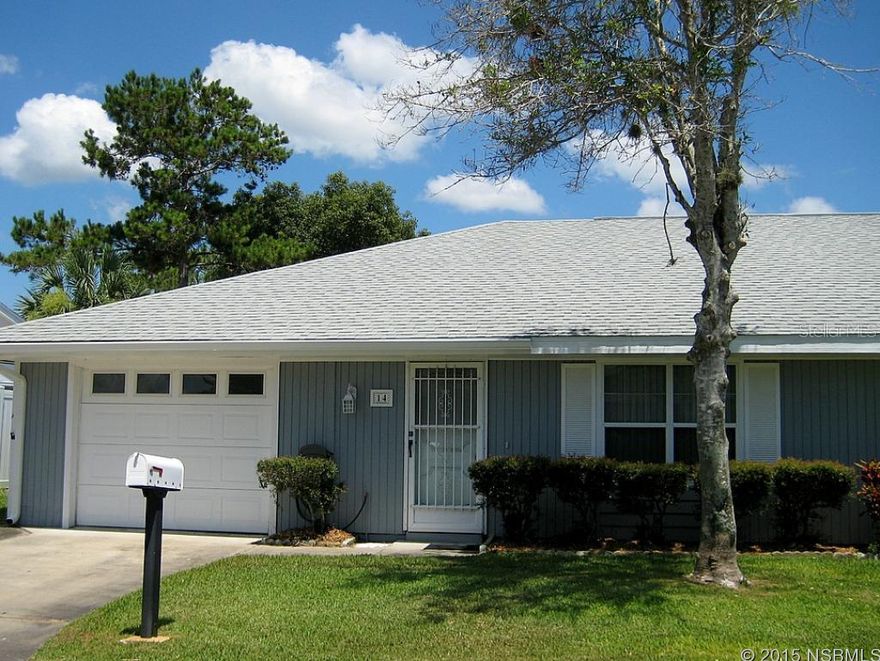 READY TO START ENJOYING THE FLORIDA LIFESTYLE?  WHETHER YOU PLAN TO LIVE HERE PART-TIME OR FULL-TIME, THIS 2 BEDROOM/2 BATH HALF DUPLEX HOME IS READY FOR ITS NEW OWNER. LOCATED IN A BEAUTIFUL GOLF COURSE COMMUNITY, THIS HOME HAS BEEN FRESHLY PAINTED WITH NEW CARPET IN BOTH BEDROOMS AND NEWER WOOD LAMINATE IN LIVING ROOM. TILE FLOOR IN DINING ROOM, KITCHEN, HALLWAY AND BATHS. KITCHEN REMODEL IN 2011 INCLUDED SOLID WOOD CABINETS PAINTED IN A SOFT VANILLA WITH CHOCOLATE GLAZE, PULL OUT SHELVING, SOFT CLOSE DRAWERS, AND GRANITE LOOK COUNTERTOPS. ALL APPLIANCES INCLUDING INSIDE WASHER & DRYER. BATHS WERE UPDATED IN 2014 WITH NEW VANITIES, MIRRORED MEDICINE CABINETS AND LIGHTING. 1-CAR GARAGE HAS AUTOMATIC DOOR OPENER, PULL DOWN LADDER FOR ATTIC ACCESS AND A STORAGE ROOM. NESTLED BETWEEN TWO GOLF COURSES AND CLOSE TO SHOPPING, RESTAURANTS, RIVER AND ONLY 10 MINUTES TO BEACH! LOW ANNUAL HOA INCLUDES TERMITE BOND, IRRIGATION WATER AND MAINTENANCE OF COMMON AREA. HOA ALSO OFFERS A DISCOUNT ON BRIGHTHOUSE CABLE TV SERVICE. THIS HOME IS BEING OFFERED WITH A COMMUNITY POOL MEMBERSHIP...ONLY 200 TOTAL POOL MEMBERSHIPS ISSUED..FOR A YEARLY FEE OF $295.00. A/C SYSTEM REPLACED IN 2011; ROOF REPLACED IN 2004 ;Water: City
