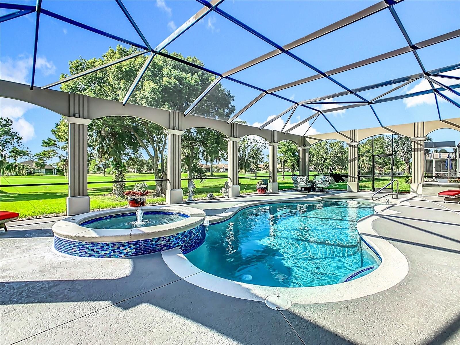 UNIQUE OPPORTUNITY TO OWN THIS LUXURY STUNNING MEDITTERANEAN **GOLF VIEW** MASTERPIECE **POOL HOME**. IT IS A GOLFER’S DREAM HOME WITH EXQUISITE UPGRADES THROUGHOUT that combines striking architectural style with serene GOLF COURSE VIEWS!!!! DESIGN TO IMPRESS, OFFERING THE COVETED “WOW” FACTOR THAT leaves an impression. *SEE THE VIRTUAL TOUR* This dream home is situated in the most desired street in Solivita, TORINO LANE, and on 1st Green of Cypress Golf Course. CLOSE to the vibrant VILLAGE CENTER offering easy access to all major events, the farmer's market, restaurants, and a state-of-the-art amenity center featuring a gym, pool, sauna, spa, tennis & pickle ball courts, a diamond softball field, playground, two dog parks, a butterfly garden, vegetable garden, ballroom, golf shop, and convenience store with a pharmacy. This MASTERPIECE has every upgrade you have ever wanted, meticulously crafted to perfection. Once inside, you will experience luxury and sophistication. This upscale open-concept COCONUT GROVE custom home has 2,343 sq. ft. ft. of interior space with a total area of 3,342. Your NEW home has TWO bedrooms, TWO bathrooms, a powder room, and a versatile FLEX ROOM with a MURPHY BED that could be a THIRD bedroom, office, study, media room or CRAFT ROOM. TWO CAR GARAGE WITH EPOXY CAR FLOORING, **GOLF CART BAY**, and overhead garage storage racks, Dual Pane Windows, WATER SOFTENER, and CROWN MOLDINGS THROUGOUT. Step into Luxury and experience the epitome of elegance from the moment you enter this breathtaking property, boasting: DIAGONAL TILE flooring throughout, creating a sense of sophistication, adding a touch of refinement. There is no property compared to this breathtaking stunning POOL HOME with GOLF VIEWS, featuring UPGRADED LANSCAPING with curbing for a lush manicured look to added sophistication, outdoor lighting to highlight the home's best features, also, this gem has an screened front porch and gutters, YOUR PRIVATE OUTDOOR OASIS RETREAT JAW-DROPPING GOLF VIEWS COMES WITH AN EXPANSIVE SCREENED LANAI, and A **HEATED SALTWATER POOL** with new pump and **INTEGRATED JACUZZI** with ambient lighting for evening enjoyment, perfect for entertaining or unwinding, this spacious OUTDOOR HAVEN features a retractable screen and a retractable awning, both enhanced with built-in lighting to set the mood and extend your living space with ease. The Heart of this GEM IS THE GOURMET KITCHEN with HIGH GRADE WATERSTONE QUARTZ COUNTERTOPS, DOUBLE OVEN, TOP OF THE LINE STAINLESS STEEL APPLIANCES, SUBWAY TILE BACKSPLASH, 42’ SOLID WOOD SOFT CLOSE DRAWERS, LOWER PULLOUT, UNDERMOUNT SINK, UPGRADED KITCHEN FAUCET, NEW GARBAGE DISPOSAL, EXTENDED BREAKFAST BAR COUNTER with Pendant lighting. undercabinet lighting, RECESSED LIGHTING. BREAKFAST NOOK AND FLORIDA ROOM. THE Spacious OWNER’S SUITE (17’ X 15’) with TRAY ceiling HAVE TWO CUSTOM DESIGN CALIFORNIA WALK-IN CLOSET, and EN-SUITE BATHROOM WITH double sink, Upgrade SPLIT vanities, QUARTZ COUNTERS, SOAKING TUB, and a walk-in shower with sitting bench. EXTENDED TWO CAR GARAGE with Golf Cart Bay, epoxy floors, AND OVERHEAD STORAGE RACKS. Inside Laundry Room with folding station and storage cabinets. If you are interested in the property, it is a clever idea to schedule a video virtual showing or arrange for a private showing to see it in person. A physical tour can provide a better sense of the space, layout, and overall feel of the property.