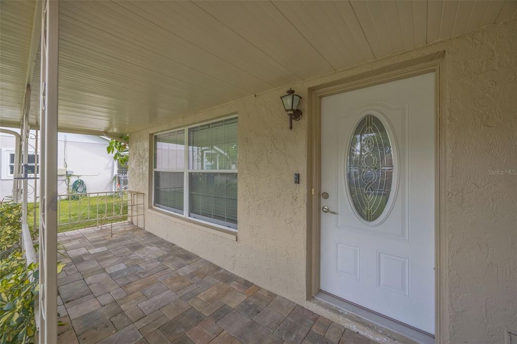 Photo of 7838 Avenal Loop, New Port Richey, FL 34655 (MLS # TB8435954)